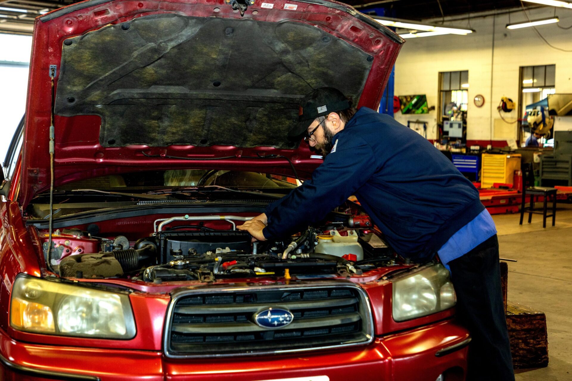 Mechanic Repairing Car Engine Mechanic Repairing Car Engine